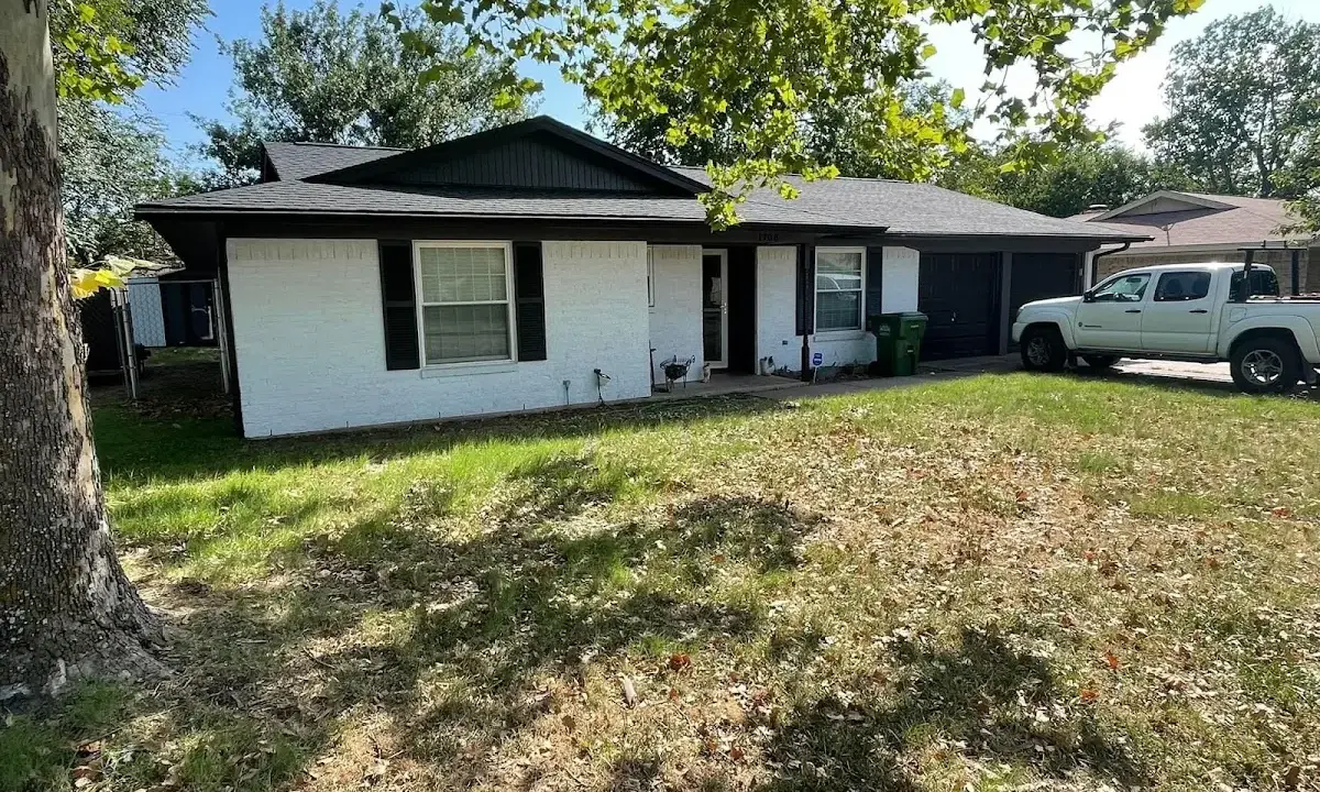 Professional roofing crew working on a residential roof in Papillion